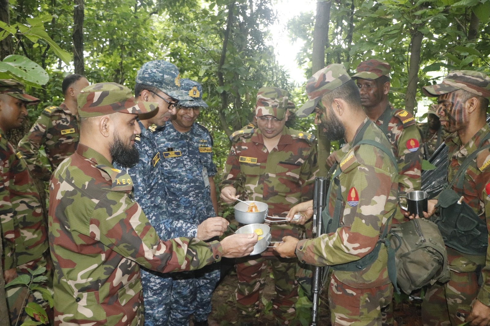 Armed Forces Division officers visiting and exchanging views with troops in Summer Training